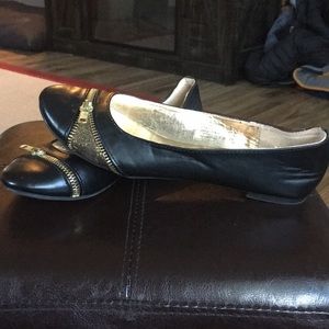 Black and gold flats